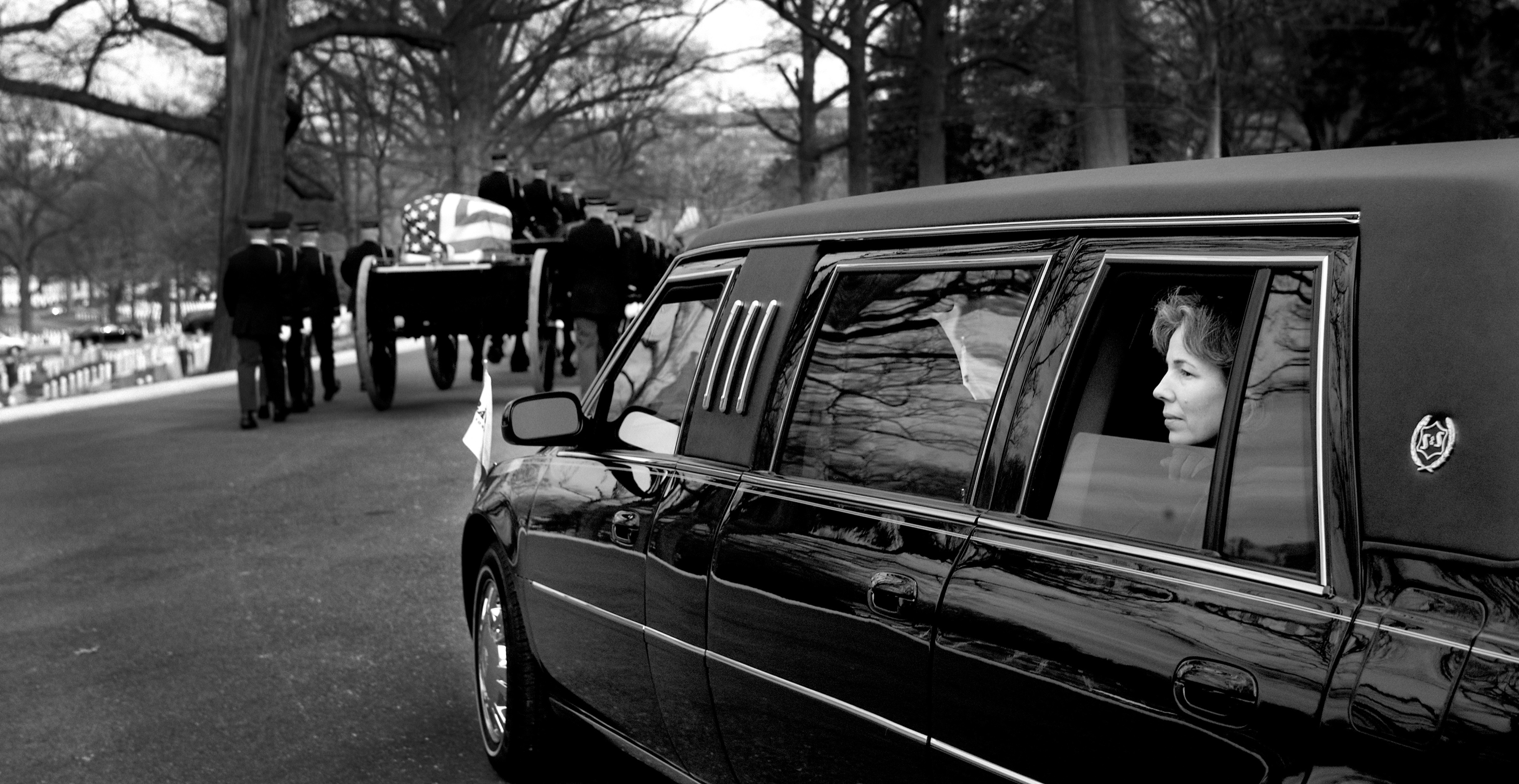 Frank Buckles's daughter Susannah looking from a limousine across Arlington National Cemetery